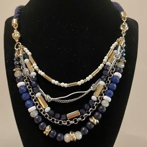 Marine themed white, navy and golden colors. 9 inches long.